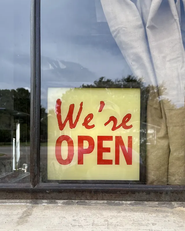 The sign in the window